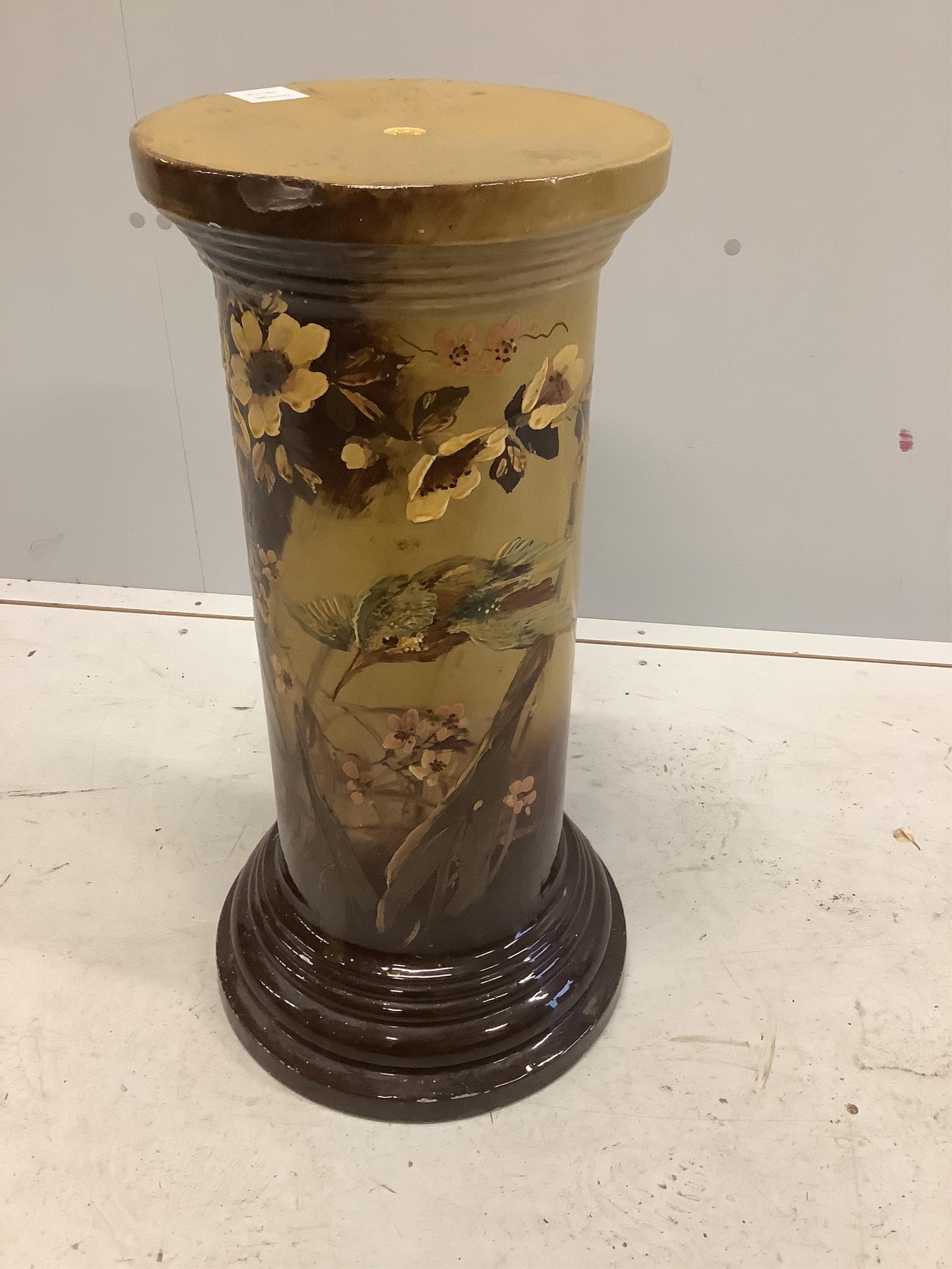 A Victorian glazed earthenware jardiniere stand, height 65cm. Condition - poor to fair